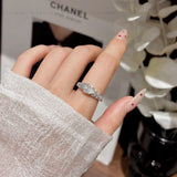 Pear Bezel Moissanite Ring